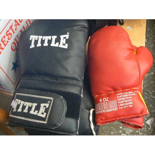 323 - 2 PAIRS OF BOXING GLOVES AND A HEAD PROTECTOR.