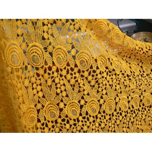 394 - CROCHETED FABRIC IN CANARY YELLOW WITH SMALL SEQUIN DETAIL.