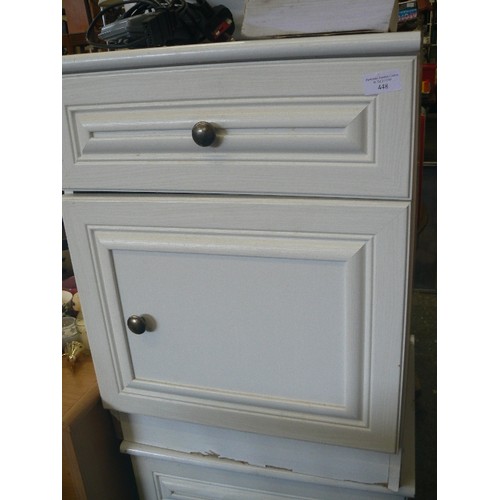 448 - 2 X IVORY PAINTED BEDSIDE CABINETS. DRAWERS CONTAIN ADJUSTABLE FEET AND CARPET PROTECTORS.