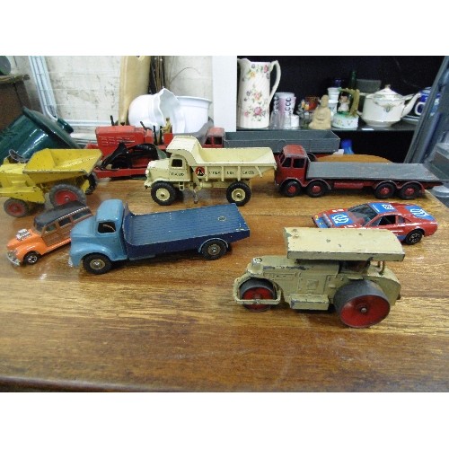 515 - 10 X VINTAGE DINKY DIE-CAST VEHICLES. INC A STEAM ROLLER, FLAT BED TRUCK, BULLDOZER, MUIR HILL DUMPE... 