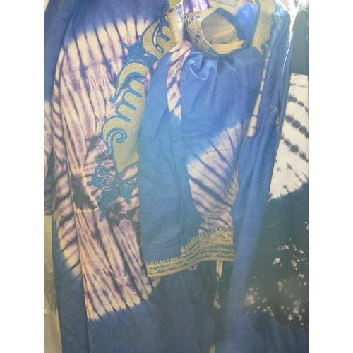 666 - 13 X AFRICAN OUTFITS. LONG TUNICS AND ELASTICATED  TROUSERS IN BEAUTIFUL VIBRANT FABRICS, MANY WITH ... 