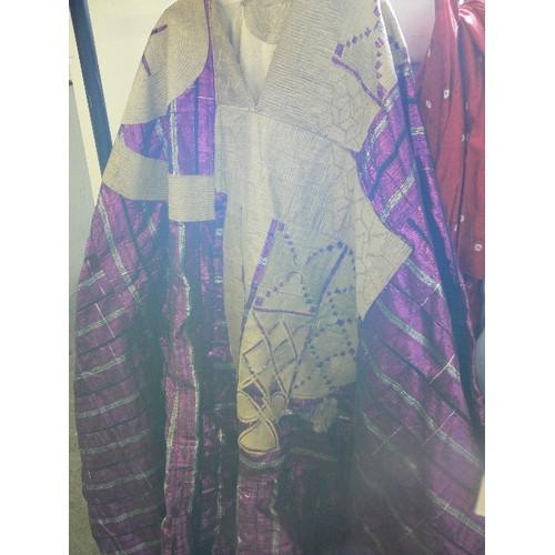 666 - 13 X AFRICAN OUTFITS. LONG TUNICS AND ELASTICATED  TROUSERS IN BEAUTIFUL VIBRANT FABRICS, MANY WITH ... 