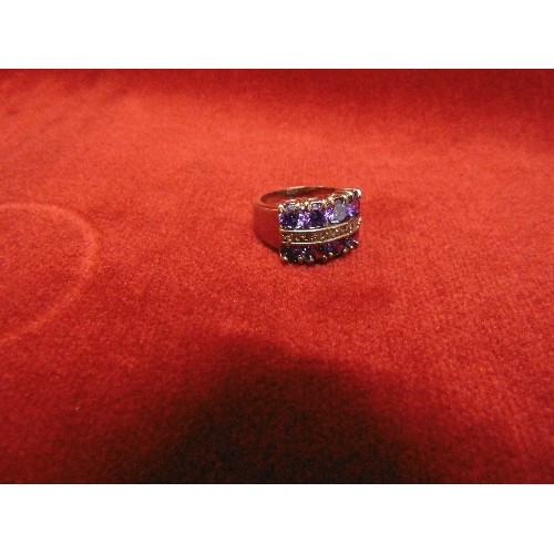 12 - LADIES DRESS RING MARKED 14KT WITH PURPLE AND WHITE STONES