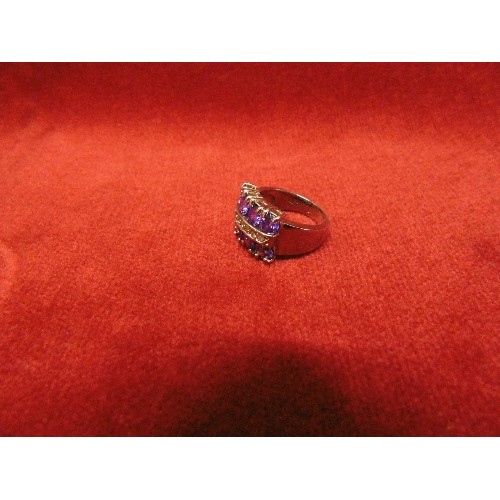 12 - LADIES DRESS RING MARKED 14KT WITH PURPLE AND WHITE STONES