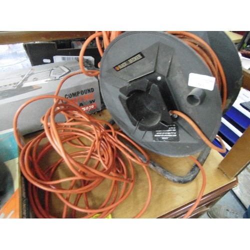 601 - LARGE BLACK & DECKER EXTENSION CABLE ON REEL. PLUS A FURTHER CONNECTOR AND CABLE.