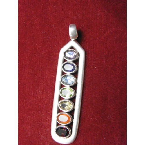 17 - SILVER AND MULTI COLOURED STONES SET INTO A PENDANT