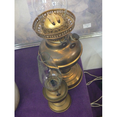 66A - LARGE OIL LAMP IN BRASS WITH CHIMNEY AND A SMALL SIMILAR ONE