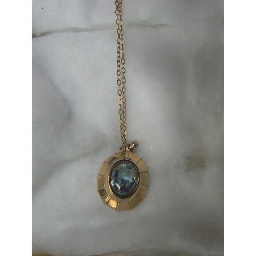 60 - A 9ct GOLD PENDANT WITH LIGHT BLUE STONE ON A  16 INCH 9ct GOLD CHAIN WEIGHT 3.56gr