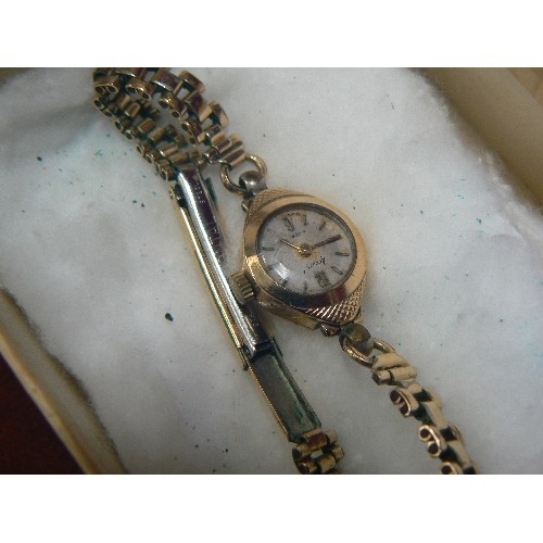 57 - AN ACCURIST 9ct GOLD LADIES WATCH NOT STRAP