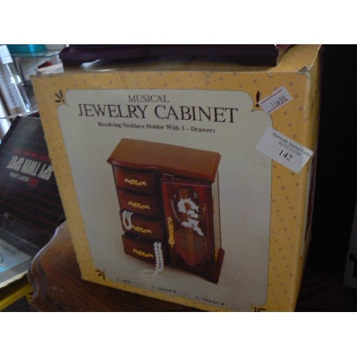 142 - MUSICAL JEWELLERY CABINET. APPEARS NEW/BOXED.