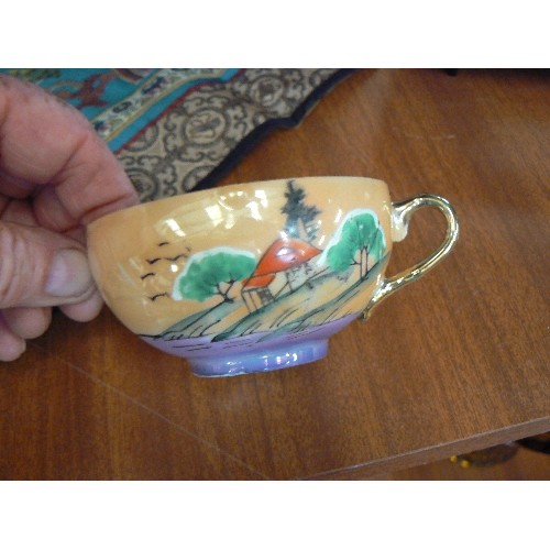 104 - VINTAGE FINE BONE CHINA JAPANESE CUP AND SAUCER, WITH EMBROIDERED ORIENTAL TABLE MAT.