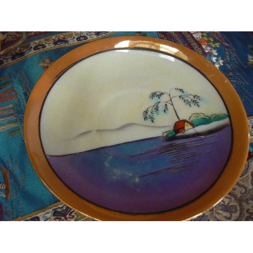 104 - VINTAGE FINE BONE CHINA JAPANESE CUP AND SAUCER, WITH EMBROIDERED ORIENTAL TABLE MAT.