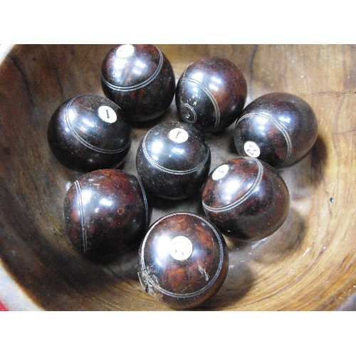 205 - SET OF VICTORIAN CARPET BOWLS CONTAINED IN A WOODEN BOWL WITH WOODEN HOLDERS