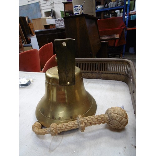 132 - HEAVY BRASS SHIPS BELL WITH WALL BRACKET AND ROPE PULL.