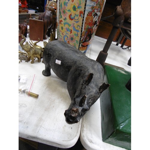 131 - LARGE VINTAGE CARVED RHINOCEROS. END OF HORN IS BROKEN.