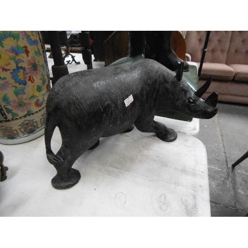 131 - LARGE VINTAGE CARVED RHINOCEROS. END OF HORN IS BROKEN.