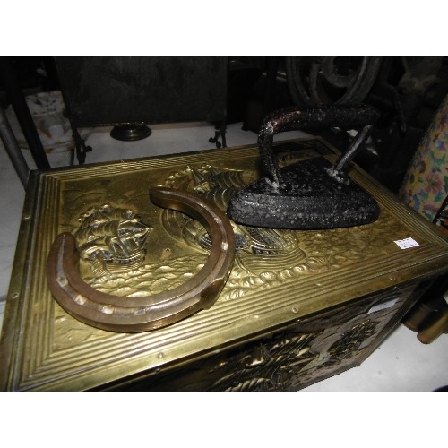 125 - HEAVY BRASS HORSESHOE, CAST FLAT IRON AND A BRASS COAL BOX WITH HINGED LID, LION HEAD HANDLES AND EM... 