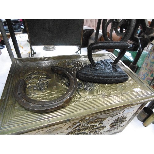 125 - HEAVY BRASS HORSESHOE, CAST FLAT IRON AND A BRASS COAL BOX WITH HINGED LID, LION HEAD HANDLES AND EM... 