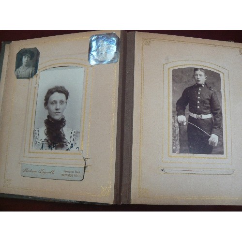 124 - SMALL ANTIQUE PHOTOGRAPH ALBUM, FULL OF PROFESSIONALLY TAKEN PORTRAITS. SOME WITH PRETTY MOUNTS.