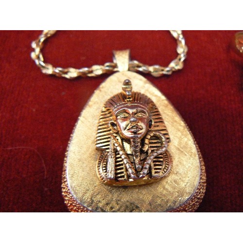 71J - EGYPTION PENDENTAND CHAIN AND PHAROH RING AND A BAG CONTANING A CROSS LOCKET AND PENDANTS