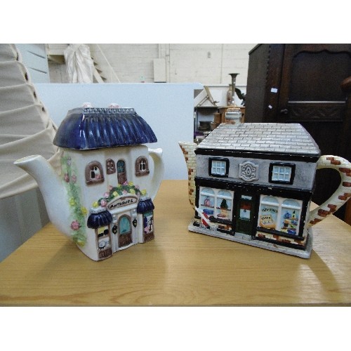 560 - THE VILLAGE-TEAPOT COLLECTABLES 'THE CHEMIST SHOP' ALSO A TEAPOT ANTIQUE SHOP.