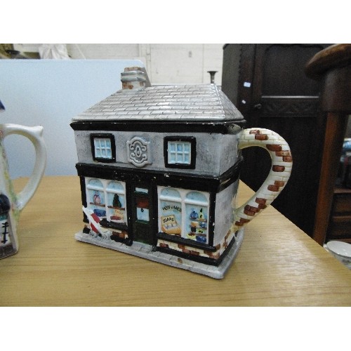 560 - THE VILLAGE-TEAPOT COLLECTABLES 'THE CHEMIST SHOP' ALSO A TEAPOT ANTIQUE SHOP.