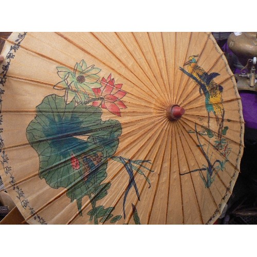 103 - WOODEN/PAPER PARASOL. FEATURES BIRDS AND FLOWERS.