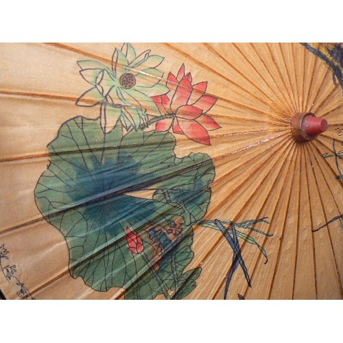 103 - WOODEN/PAPER PARASOL. FEATURES BIRDS AND FLOWERS.