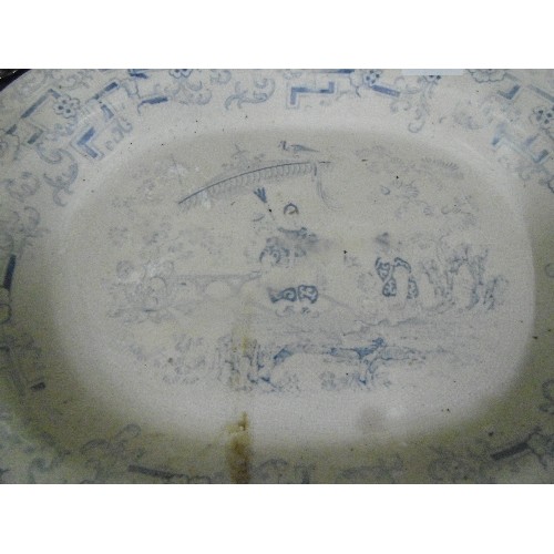 88 - OVAL MEAT PLATE IN FADED BLUE AND CREAM. FEAUTURES ORIENTAL FIGURES UNDER A PARASOL.