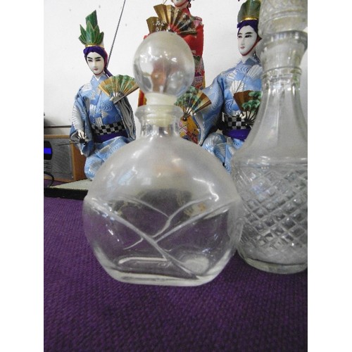 104 - ATTRACTIVE DARK GREEN DECANTER, WITH STOPPER. ALSO 2 SMALLER CLEAR GLASS DECANTERS.