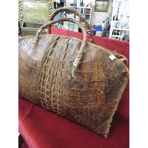 106 - LARGE GENUINE VINTAGE CROCODILE SKIN BAG FROM WEST AFRICA.