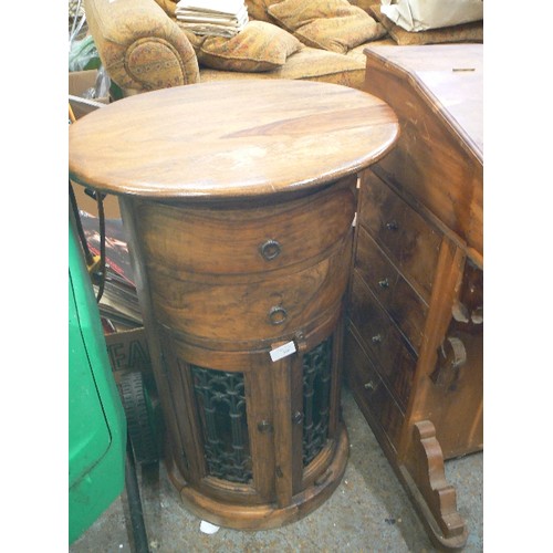 336 - JALI-WOOD OVAL CYLINDER CABINET. DOORS WITH HEAVY IRONWORK DETAIL, AND 2 DRAWERS.