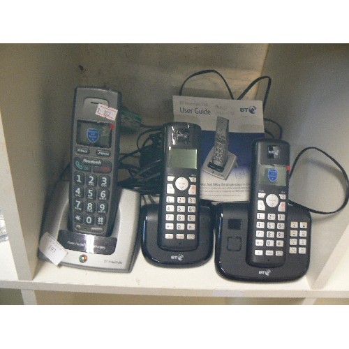 193 - 3 X CORDLESS BT PHONES, CELLOPHANE STILL OVER SCREENS ETC. DOCKING STATIONS/CHARGERS.