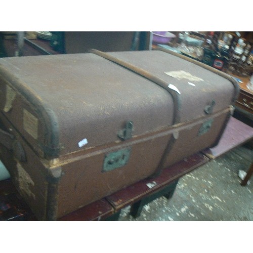 247 - VINTAGE STEAMER TRUNK COMPLETE WITH CARRIAGE FEE STICKERS ETC. WOODEN BANDIND AND METAL CORNERS ETC.