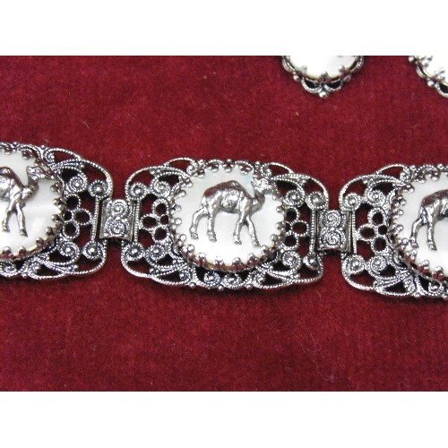 17 - SILVER METAL AND MOTHER OF PEARL BRACELET AND EARRING SET WITH CAMELS