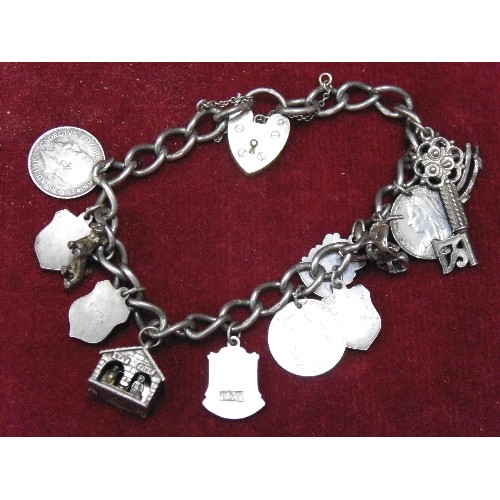 15 - SILVER HALLMARKED BRACELET WITH SILVER CHARMS, THREEPENCE COINS, ETC