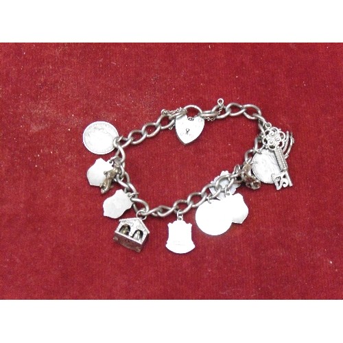 15 - SILVER HALLMARKED BRACELET WITH SILVER CHARMS, THREEPENCE COINS, ETC