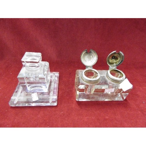 104 - ATTRACTIVE VINTAGE GLASS INKWELLS. A DOUBLE ON A STAND, WITH SILVER-PLATED LIDS, AND A SINGLE WITH G... 