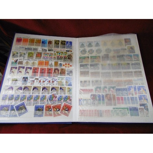 86 - STAMP STOCK BOOKS X 4. ALL APPEAR TO BE FULL. INC FRENCH COLONIES, AUSTRALIA, GERMANY, AND CANADA. A... 