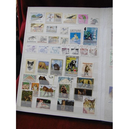 94 - 4 X STAMP STOCK BOOK ALBUMS. WITH CONTENTS. SPAIN, BELGIUM, ANIMALS, FISH, AND THAILAND.