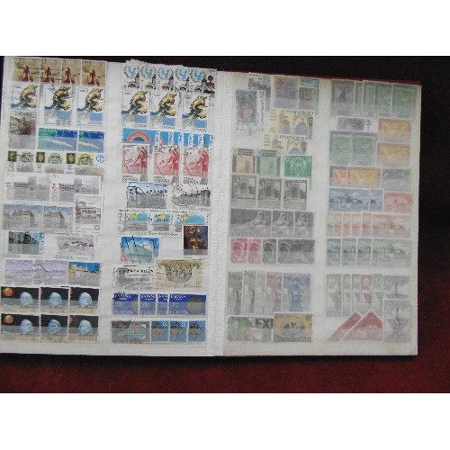 94 - 4 X STAMP STOCK BOOK ALBUMS. WITH CONTENTS. SPAIN, BELGIUM, ANIMALS, FISH, AND THAILAND.