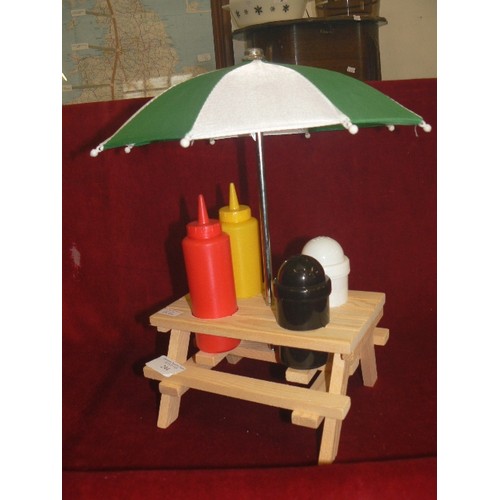 244 - NOVELTY OUTDOOR/PICNIC CRUET & SAUCE SET, IN THE FORM OF A PATIO TABLE WITH PARASOL.