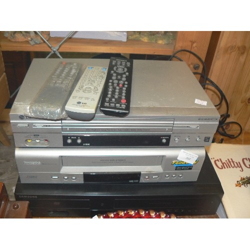 303 - SAMSUNG V6800, PHILIPS VR5-40, AND LG LV880, VHS AND DVD PLAYERS. WITH REMOTES.