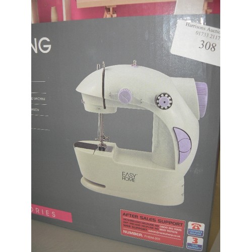 308 - MINI SEWING MACHINE, COMPACT SIZE-2 SPEED SETTINGS. APPEARS ALMOST NEW, IN ORIGINAL BOX WITH ACCESSO... 