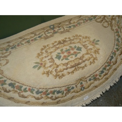 343 - HALF-MOON, SEMI-CIRCULAR SCULPTURED RUG. CREAM WITH PALE GREENS, PEACHES ETC.