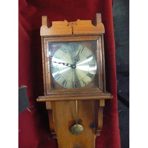 238 - WOODEN CASED WALL CLOCK WITH BAROMETER. PEDIMENT IS DETACHED & REQUIRES GLUE.