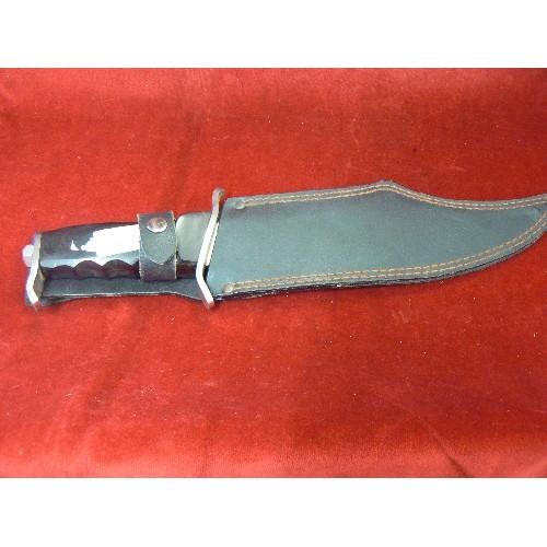 59 - A VERY LARGE HUNTING KNIFE WITH SHEATH  11 INCH BLADE 16 INCHES OVERALL EXTREMELY SHARP BLADE, SAW C... 