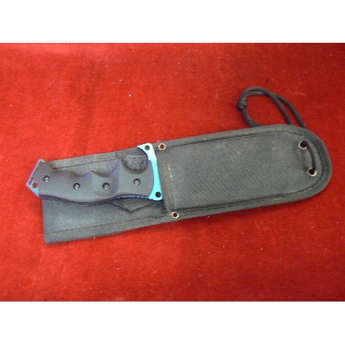 60 - AN EXTREMELY SHARP HUNTING KNIFE WITH SHEATH SAW BACK TO BLADE 11 INCHES OVERALL 
NOT FOR SALE TO UN... 