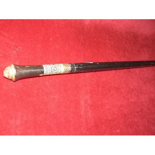 17 - A SWAGGER STICK WHICH IS A SWORD STICK MADE IN INDIA WITH BONE COLLAR AND BRASS ENDS