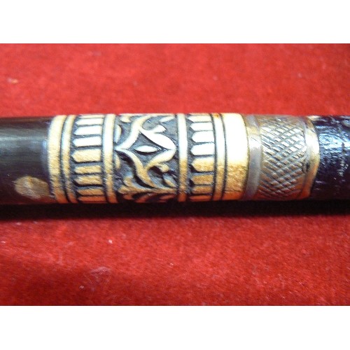 17 - A SWAGGER STICK WHICH IS A SWORD STICK MADE IN INDIA WITH BONE COLLAR AND BRASS ENDS